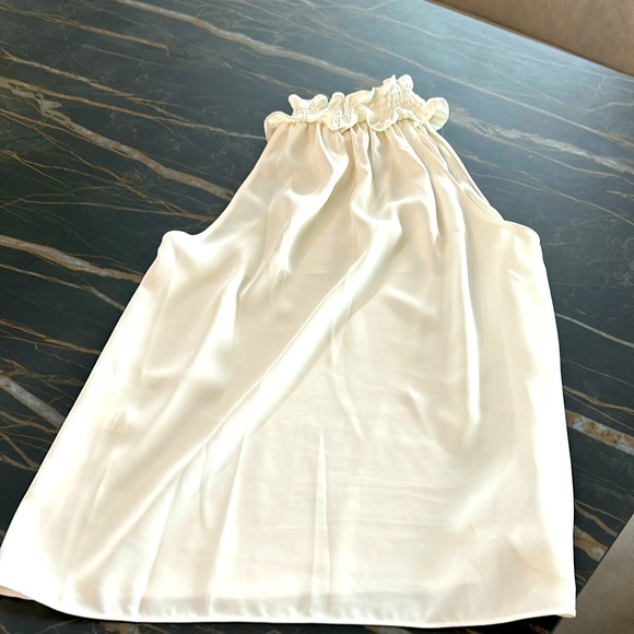 Sleeveless ruffle neck blouse - Picture 1 of 3